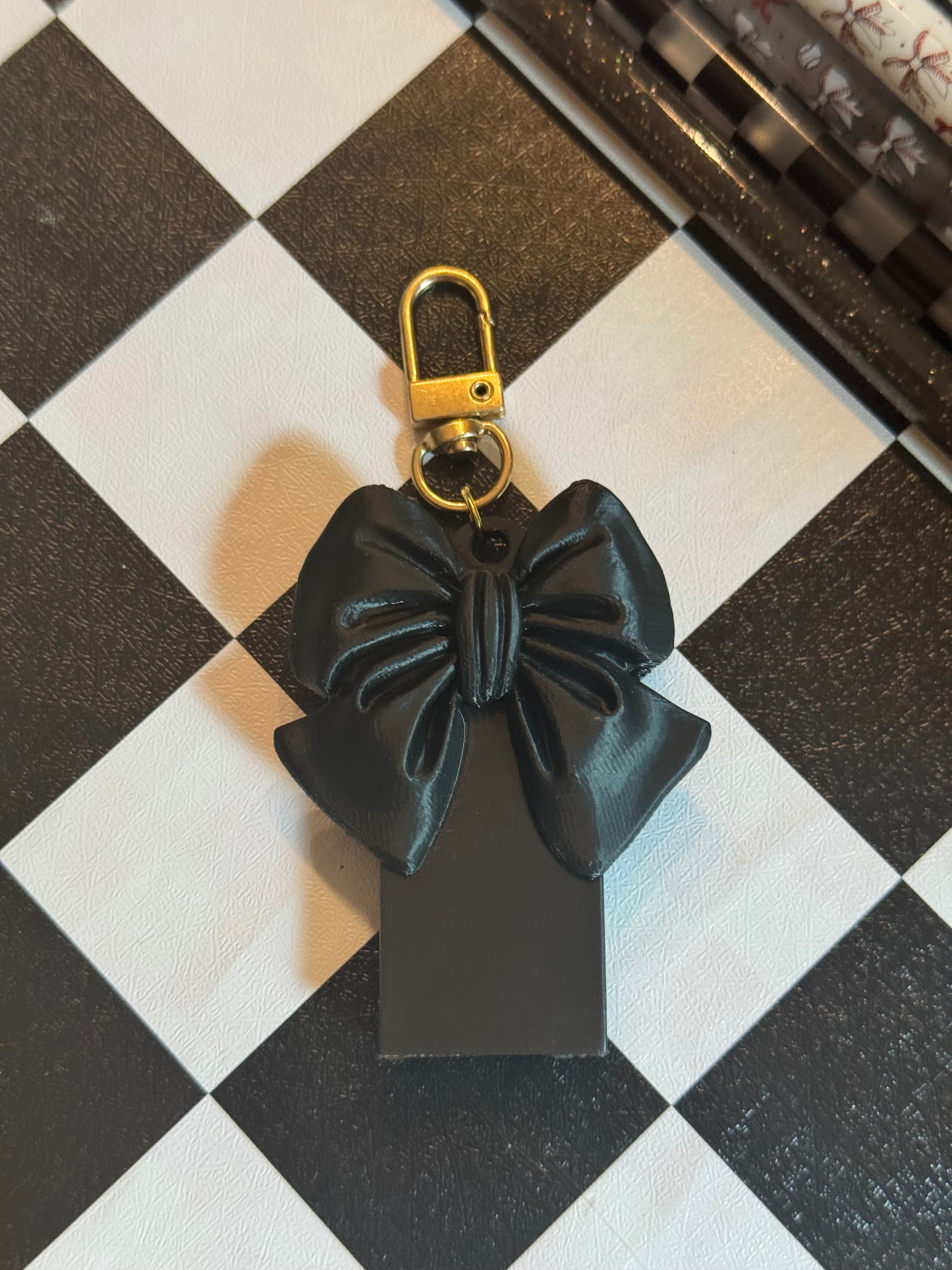 Bow pop top can opener headed- Black
