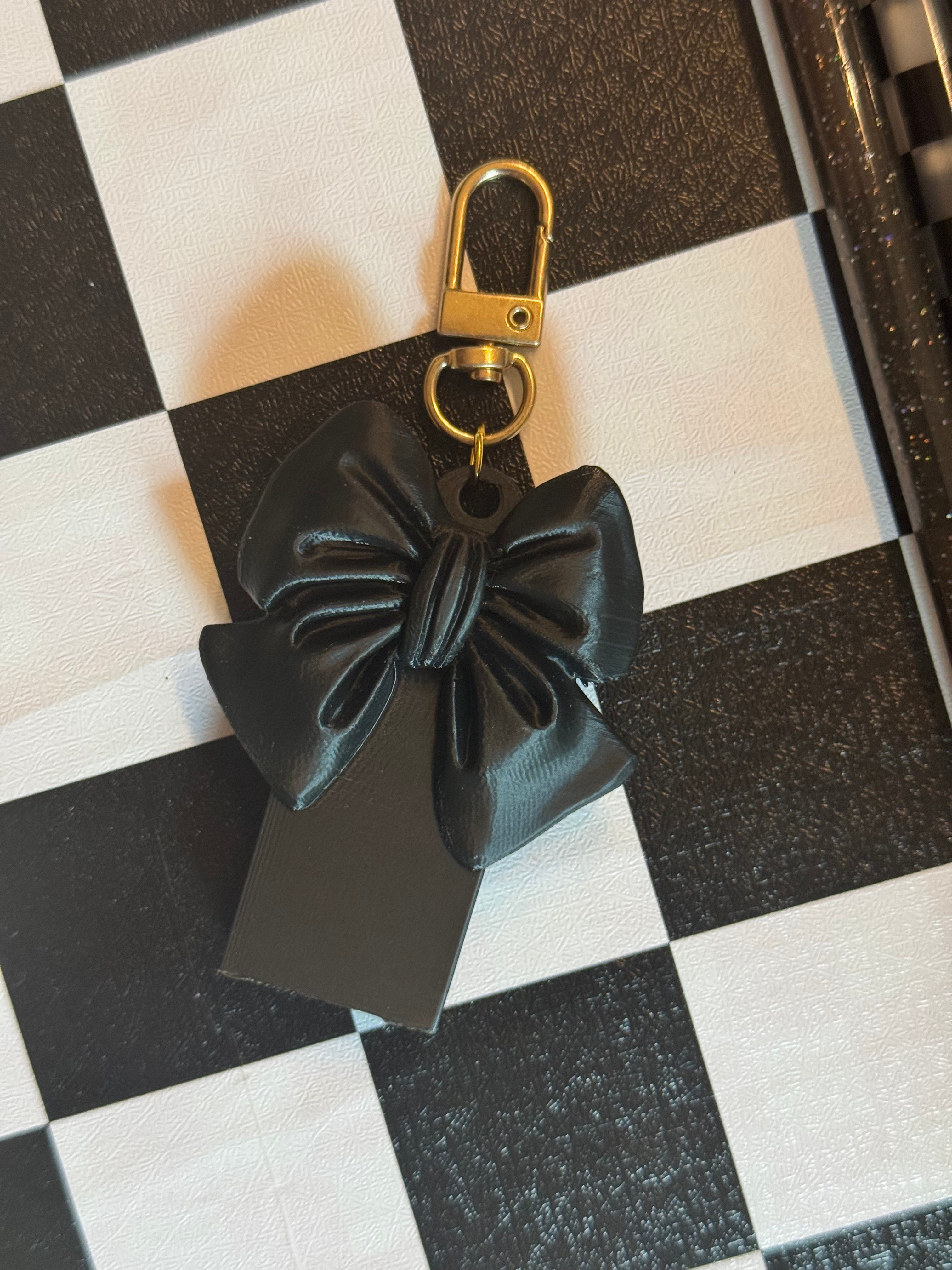 Bow pop top can opener headed- Black